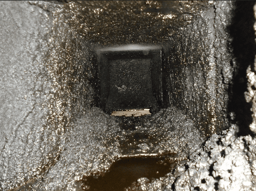 Kitchen hood before cleaning - heavy grease buildup